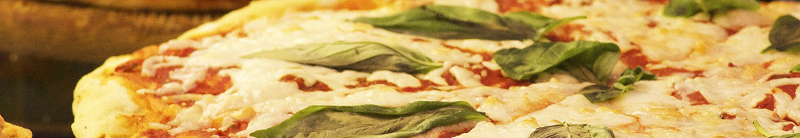 Eating Italian Pizza at Montesini Pizzeria & Pasta restaurant in Marlton, NJ.